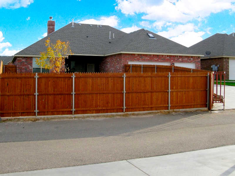 Home with Wood Stained Fence